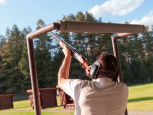 man practicing on clay target shooting a man practicing on clay target shooting, outdoor sunny daytime image, no people