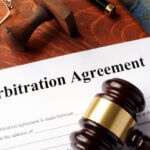 Arbitration,Agreement,Form,On,An,Office,Table.