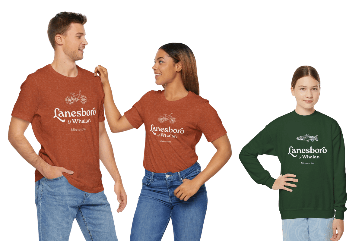 A man, a woman, and a girl wearing Lanesboro & Whalan shirts