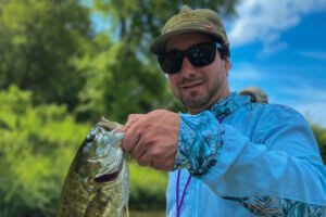 Man holding a fish he caught