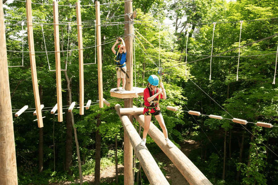 Kids doing the high ropes course at Eagle Bluff near Lanesboro