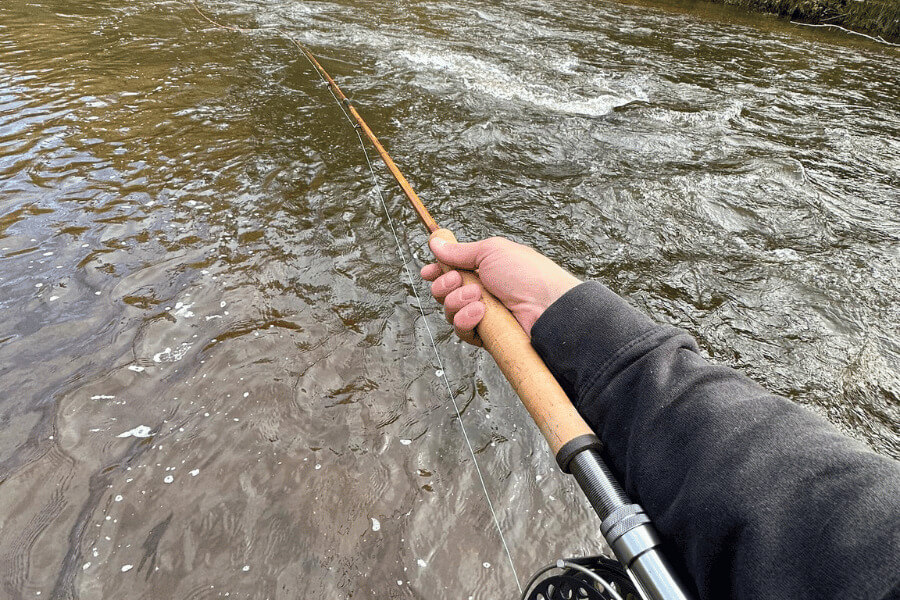 Person fly fishing on the Root River