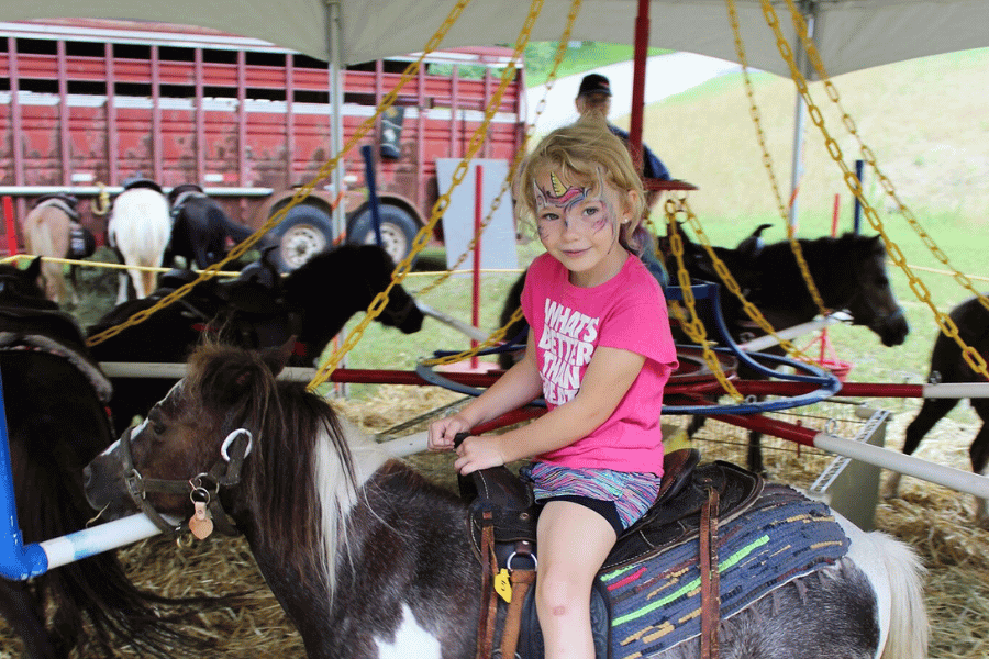 A girl on a pony ride at Buffalo Bill Days