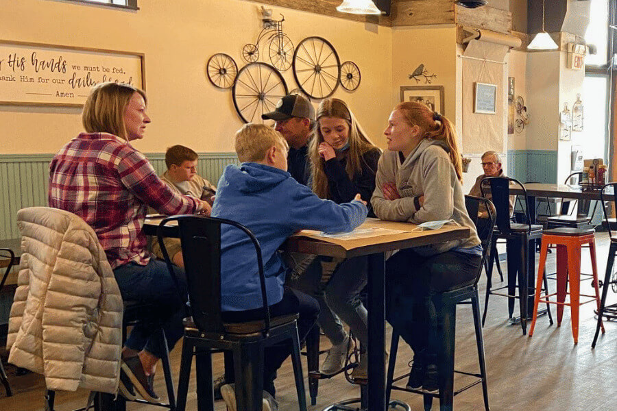 A family enjoying a meal at Pedal Pushers Cafe