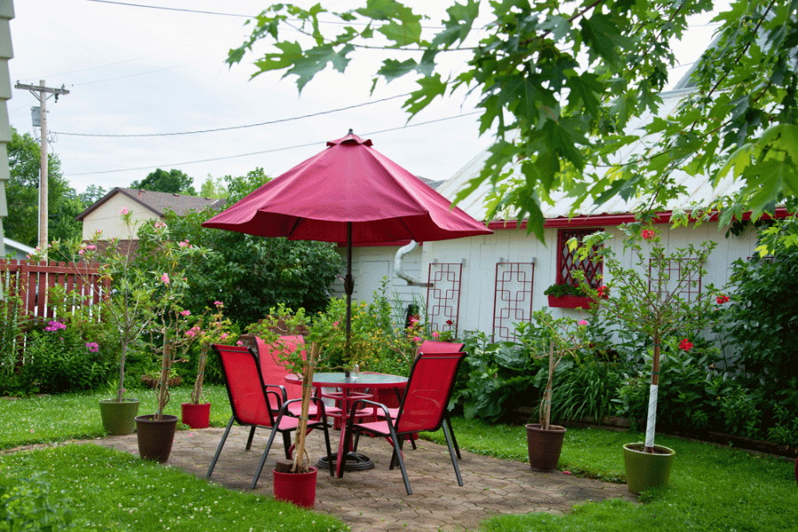 Outdoor patio space at A Guest Hus Motel.