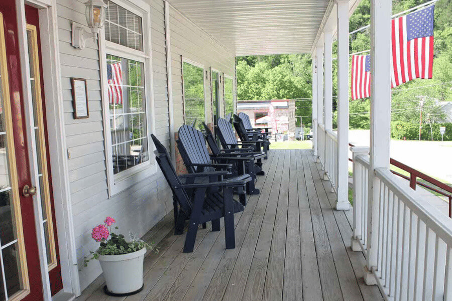 The front porch of the Cottage House Inn in Lanesboro, MN