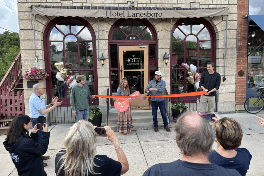 Owners Chelsey and Levi Skelly during the May 2024 ribbon cutting for Hotel Lanesboro