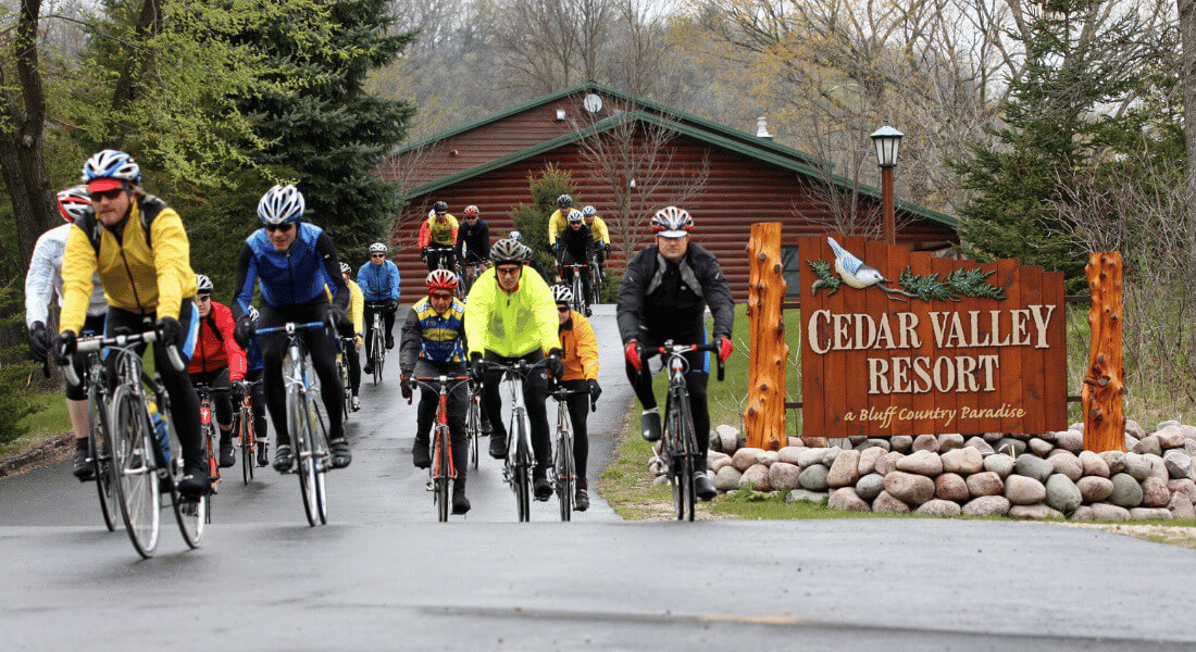 A group of bikers on a rainy day at Cedar Valley Resort in Whalan, MN