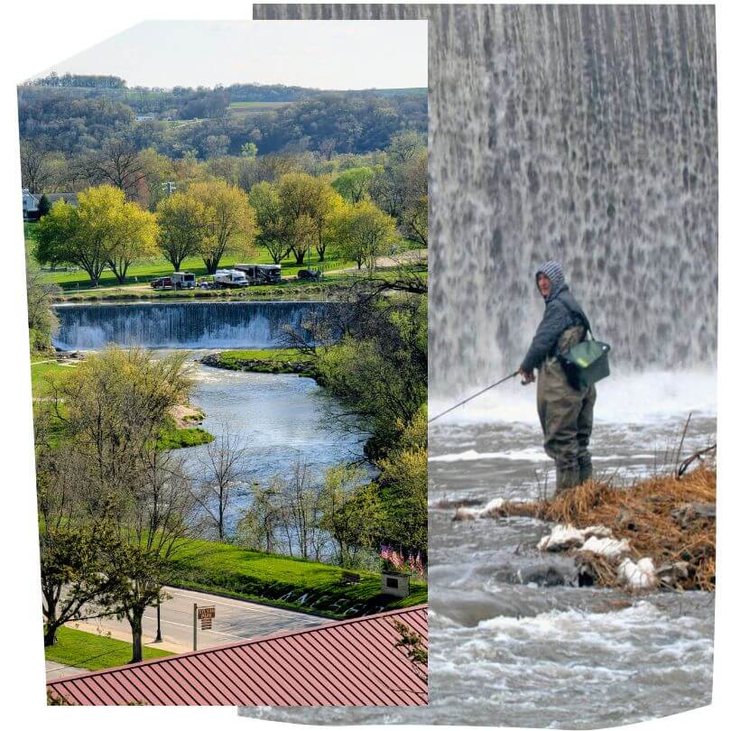 A scenic view of the Lanesboro Historic Stone Dam and Root River in spring, with Sylvan Park in the background, alongside an angler fly fishing below the waterfall.