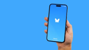 hand-holding-bluesky-app