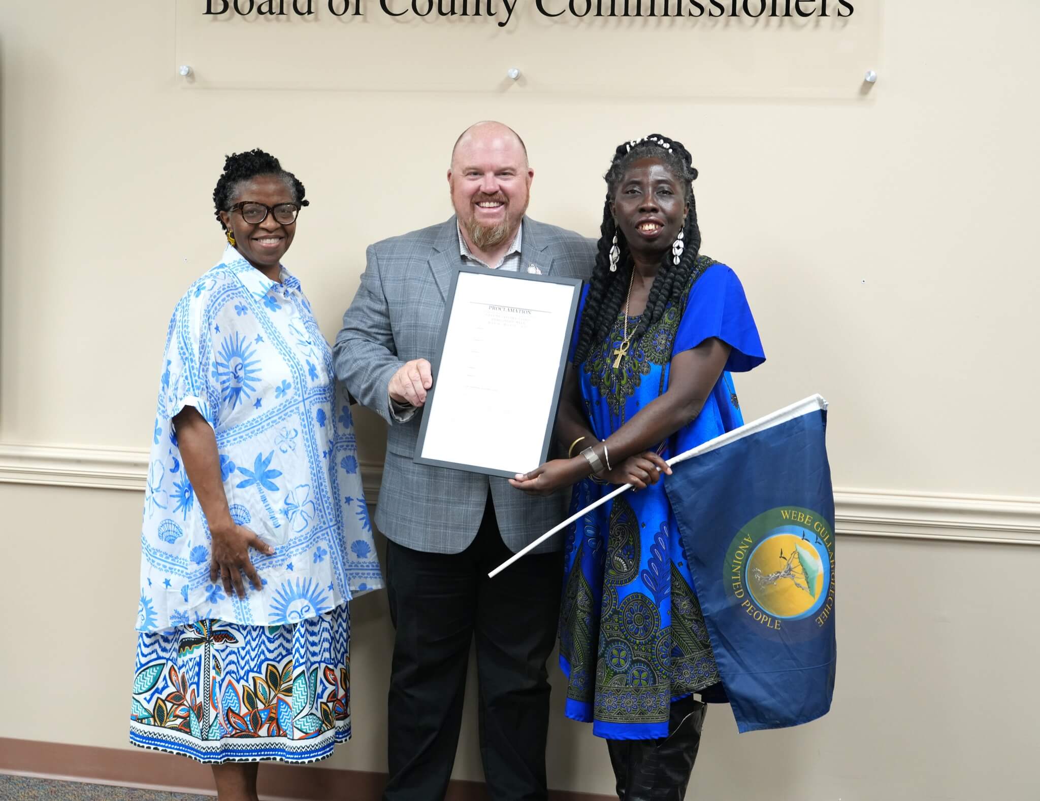 499366371_1167491708750703_285050447843561810_n Pictured: Ms. Glenda Simmons Jenkins, Executive Director for the Gullah/Geechee Nation Culture Community Trust; Commissioner Klynt Farmer; and Queen Quet, Chieftees of the Gullah/Geechee Nation