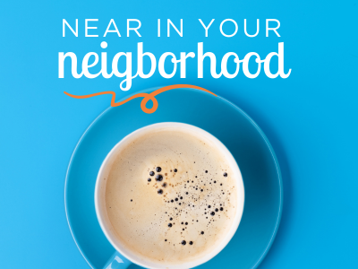 Image of a full coffee cup on a saucer with blue background.