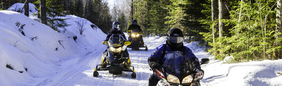 Snowmobiliers on Trail