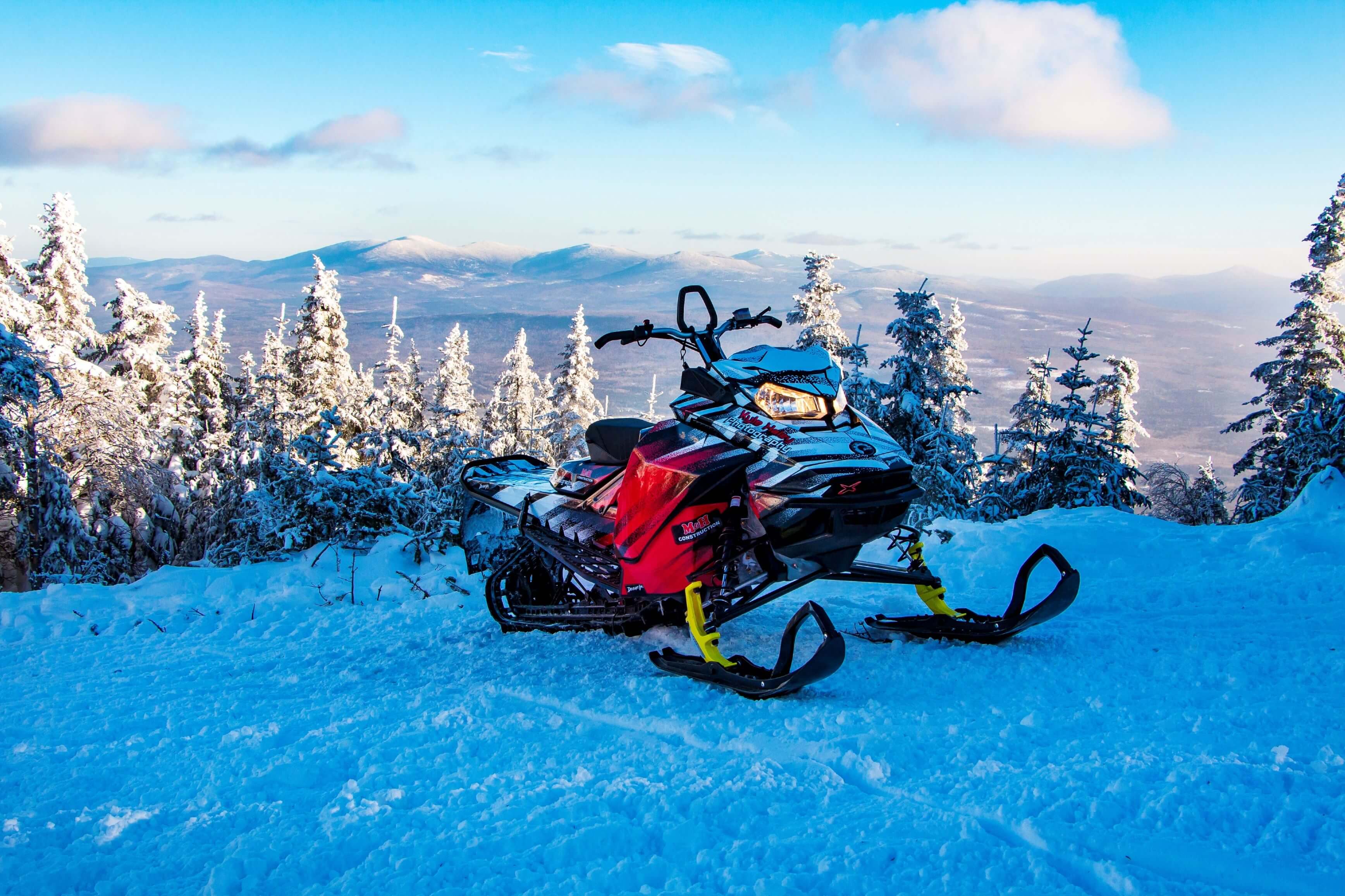 Snowmobile on Mountain Top