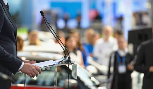 Politician speaking publicly from the lectern during political rally, Nikon Z7 Politician speaking publicly from the lectern during political rally, Nikon Z7