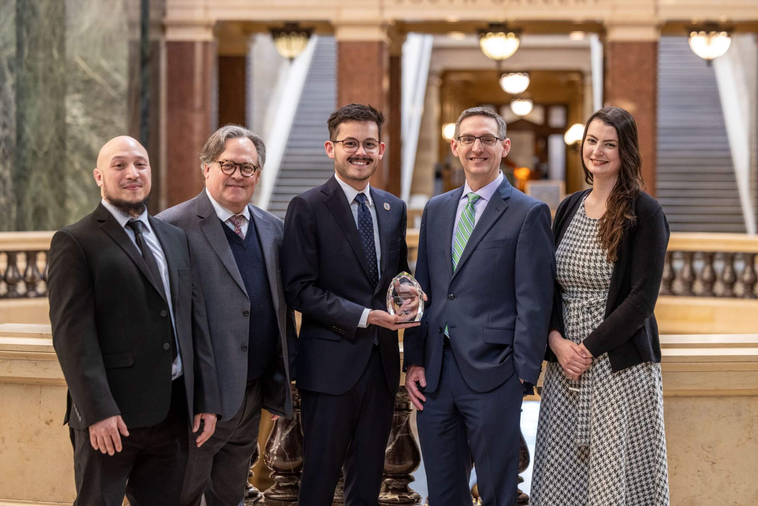 Representative Callahan receives his award from (from left) PIA Legislative Committee Members Christian Montezon &amp; Ken Werner Jr., PIA Executive Director Pete Hanson and Communications Director Natalie White