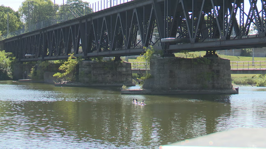 metal railroad bridge over water