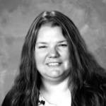 black and white photo of female. long hair. white