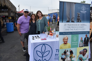 3 people at truewood table