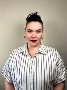 Zulynette, an award-winning queer Boricua performer, artist, author, and facilitator.