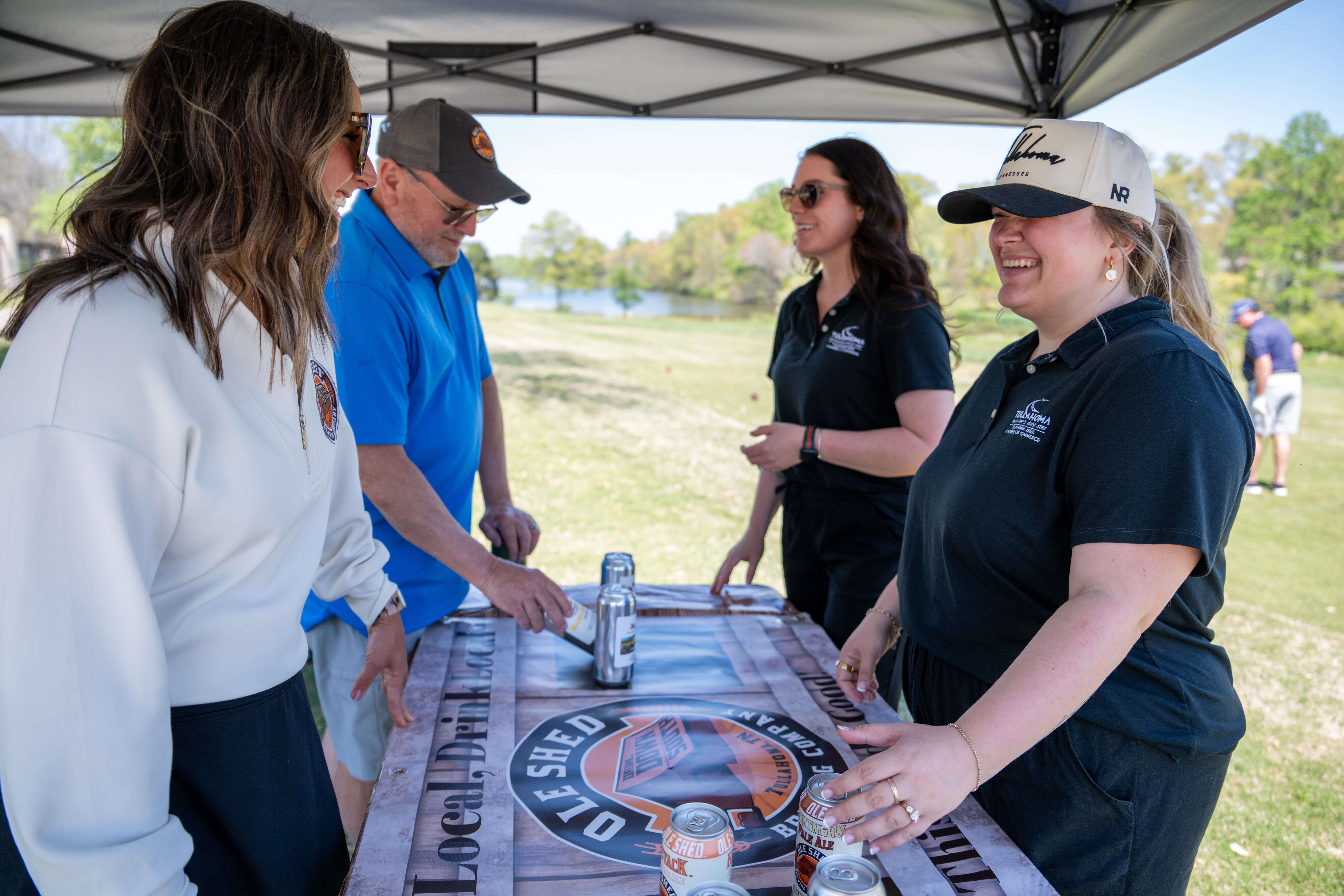 Hope Nunley and Kathryn Wiseman networking with Ole Shed Brewing Co at the Spring Chamber Classic Golf Tournament that takes place every year in Tullahoma, Tennessee.