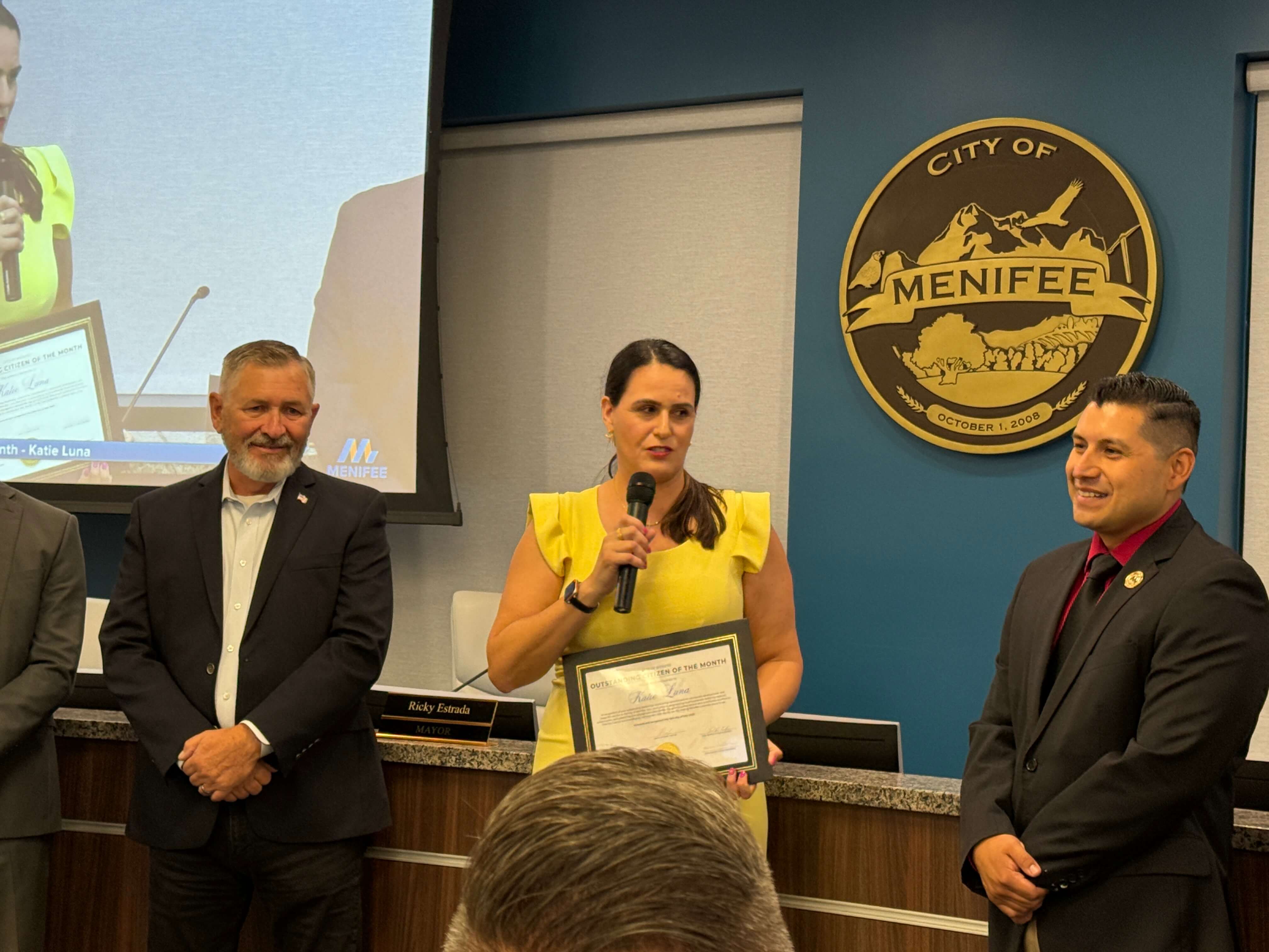 Katie Luna speaks after receiving award from Mayor Ricky Estrada