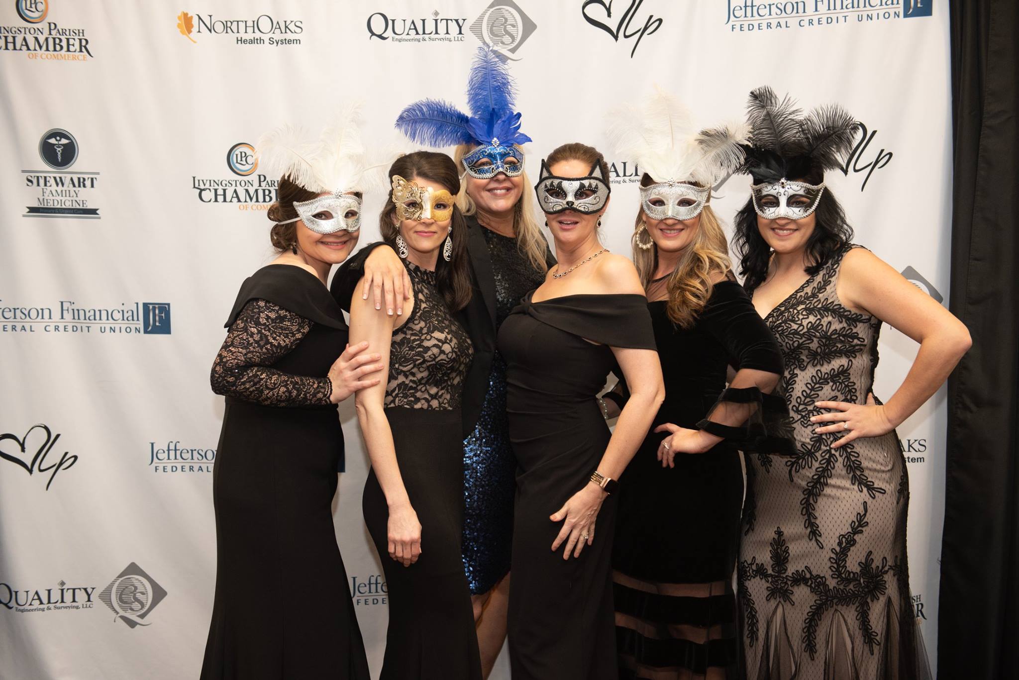 Women with masks at Gala