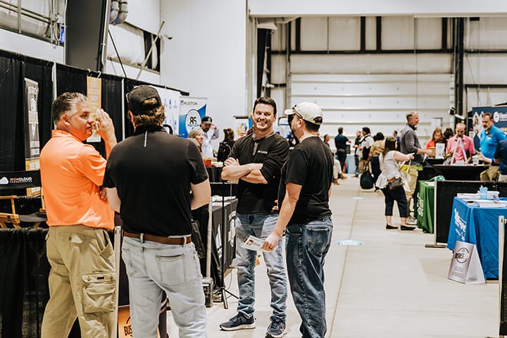 Group of business owners, in a discussion at the business expo