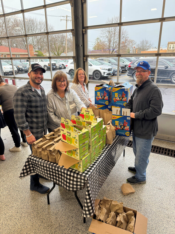 Community meal packing event at ProAuto
