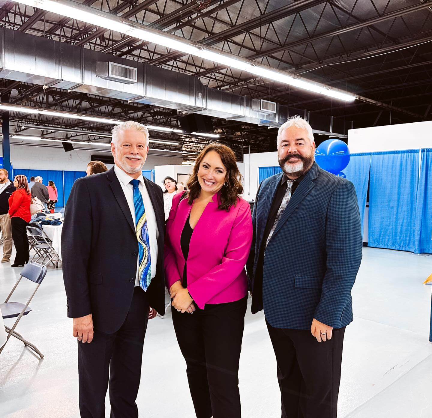 VP of Membership, Events and Education Mike Howard and Marketing Director Laurie Conway with Marshall County Chamber of Commerce President Scott Reager at Marshall County's Annual Dinner in October 2022