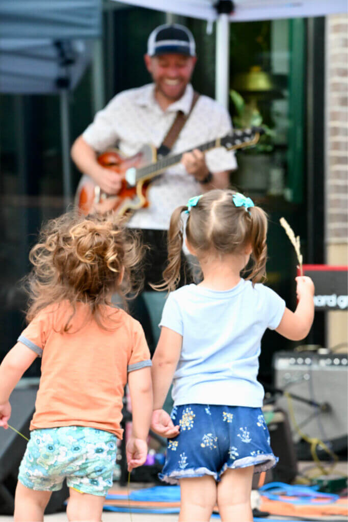 Kids watching Music on the Plaza