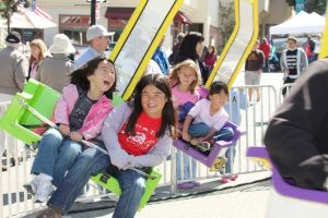 kids in a fair ride