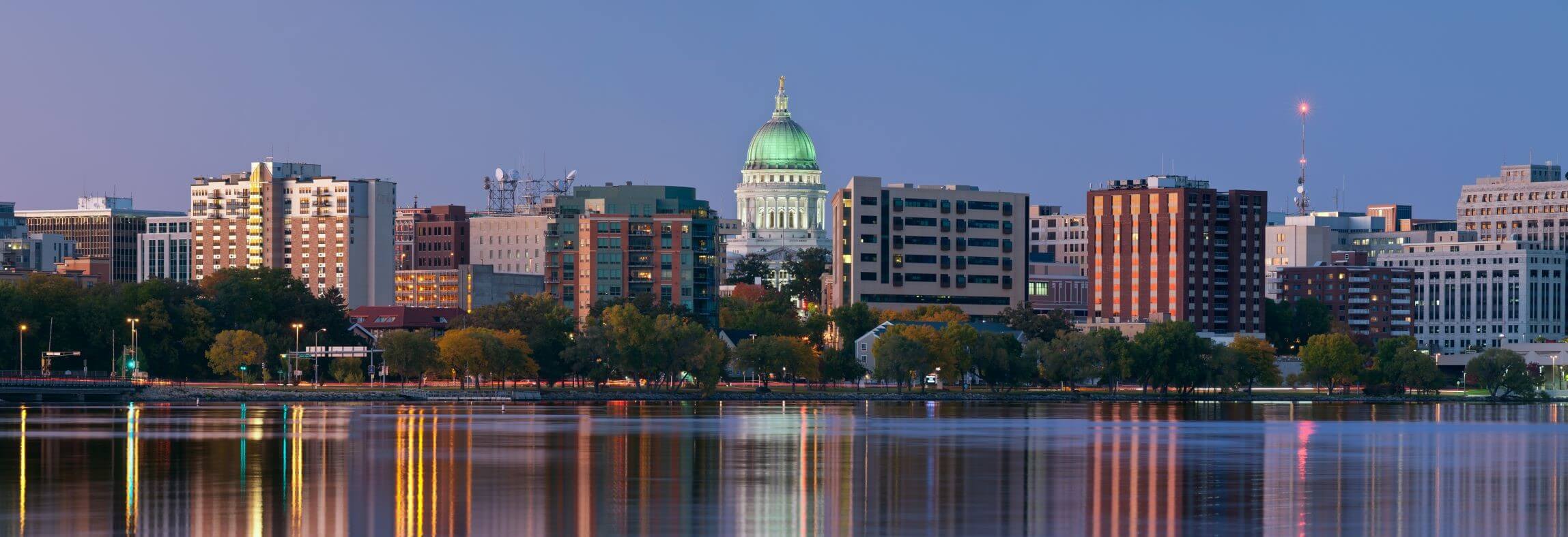 Madison with a lake and tall office buildings