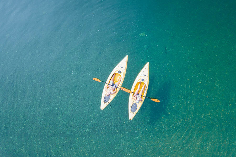 kayaks on clear water