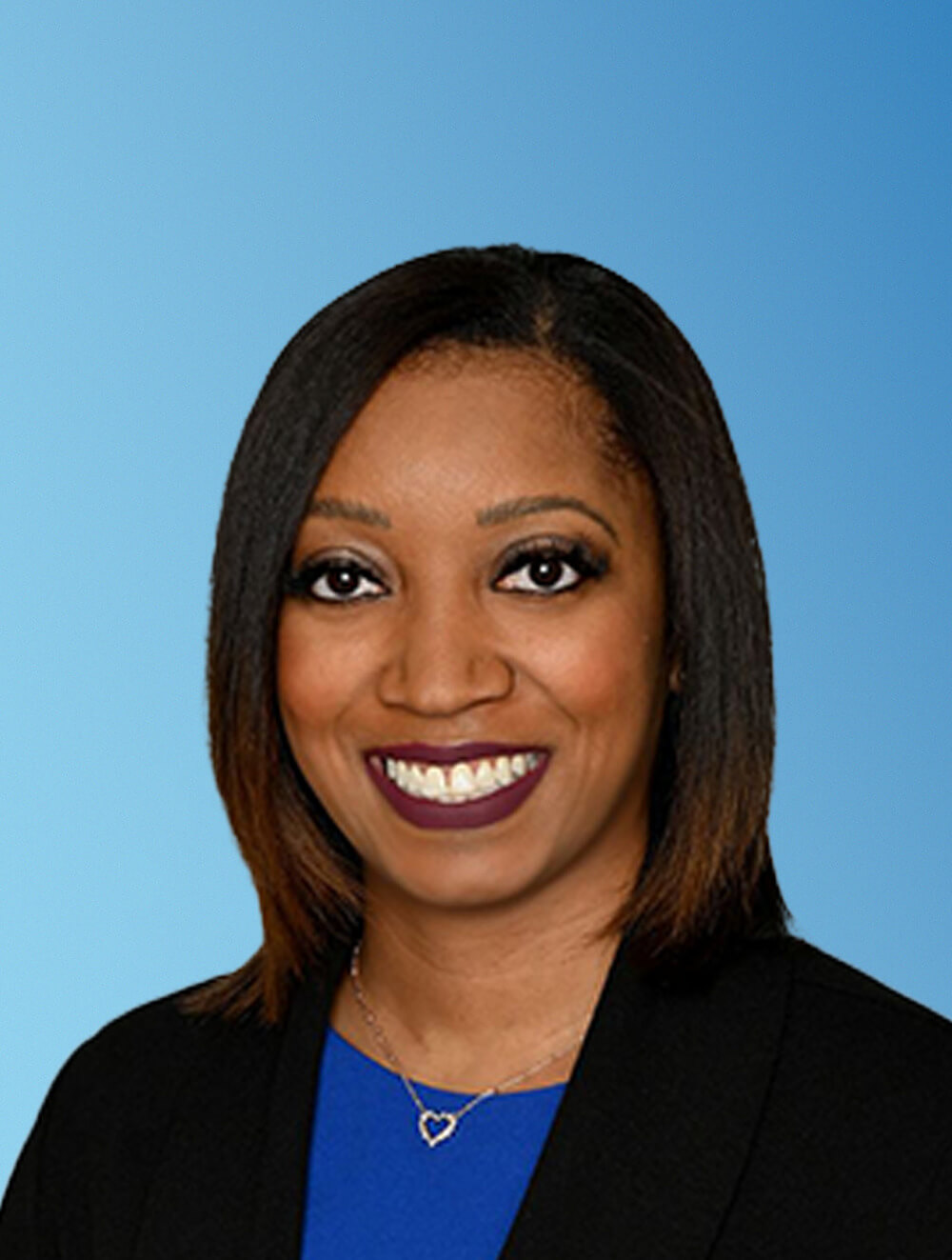 Sherby Janay Holmes - Blue Backdrop Headshot - 03.10.25 Sherby Janay Holmes - Blue Backdrop Headshot - 03.10.25
