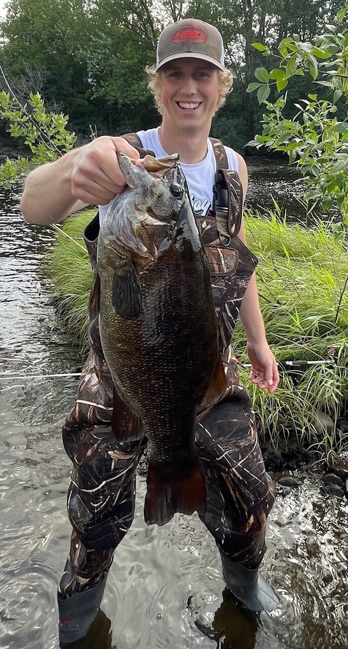 young man with a fish