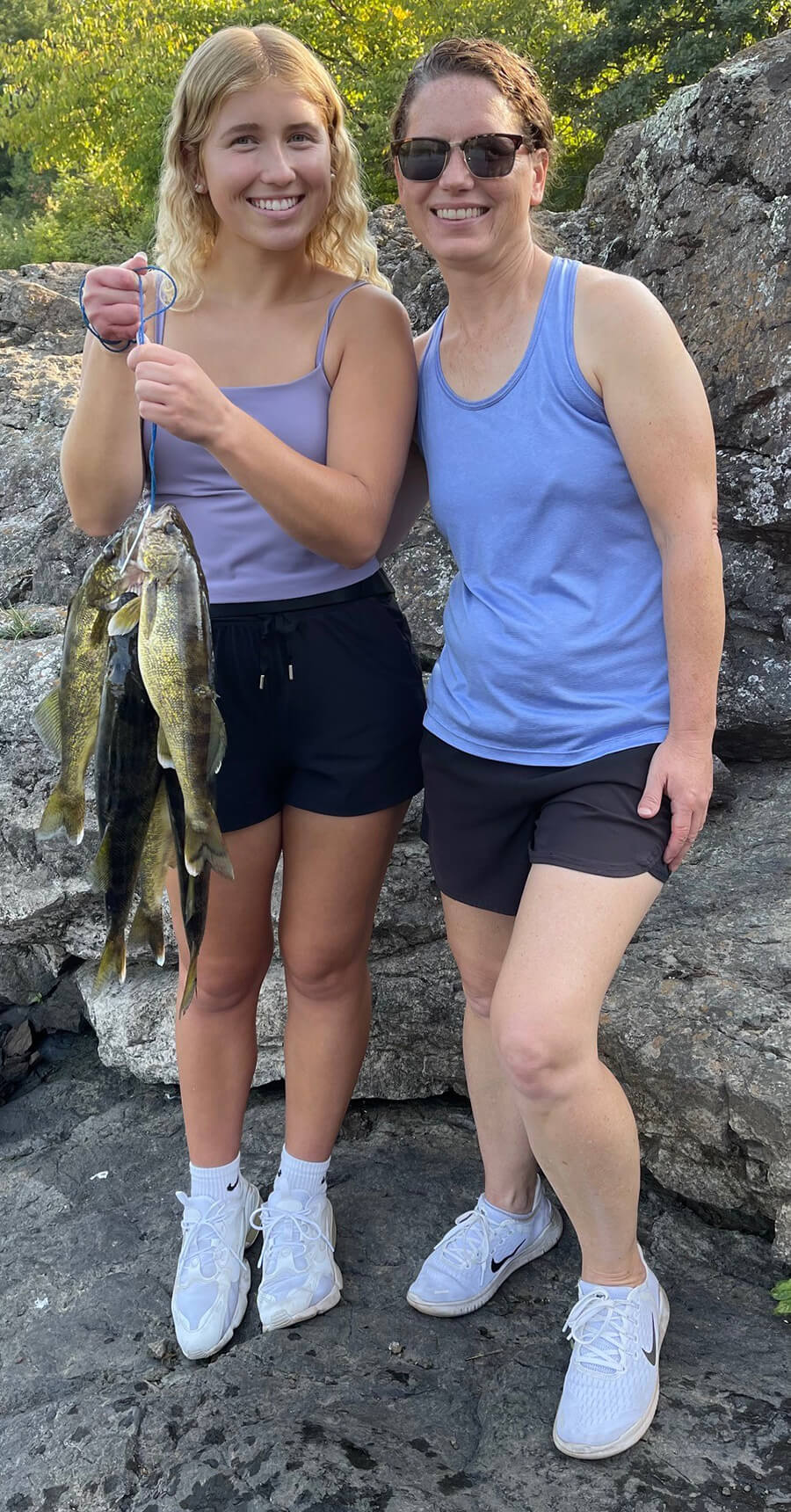 2 women with fish