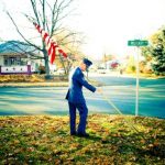 officer planting flag