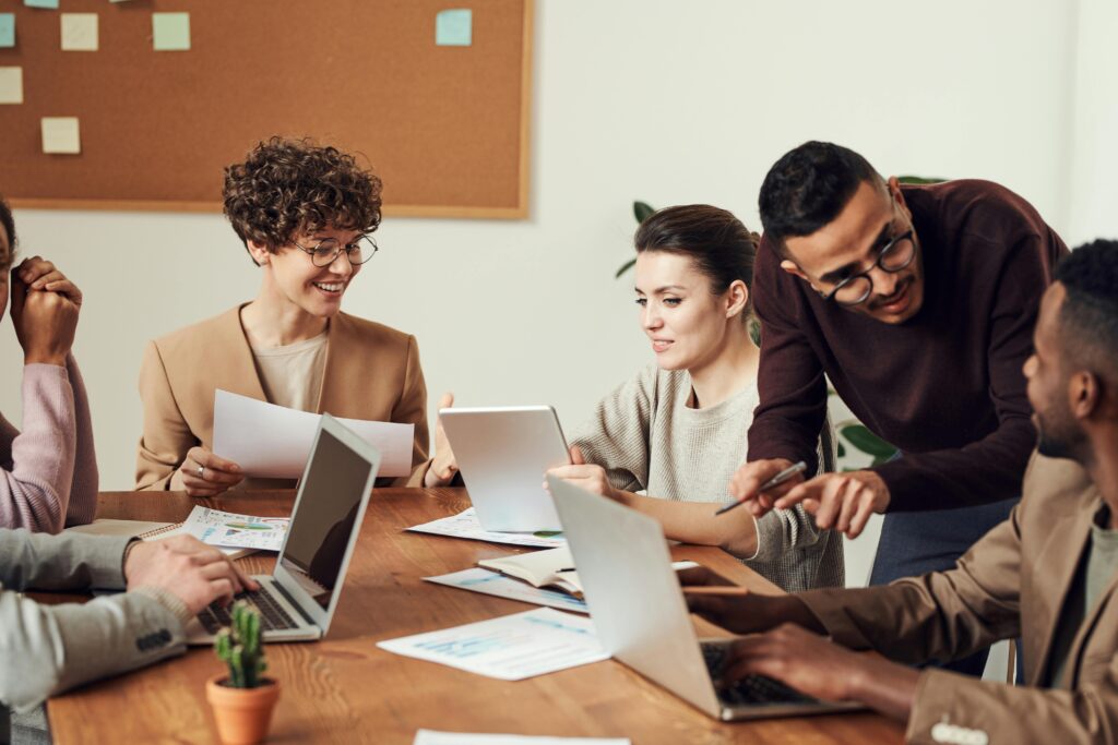 Group of professional gathered in an office brainstorming