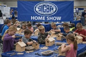 Kids building birdhouses at SICBA Home Show