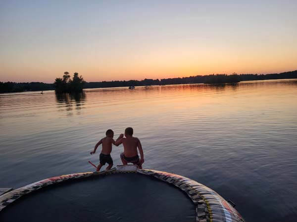 kids playing on the lake