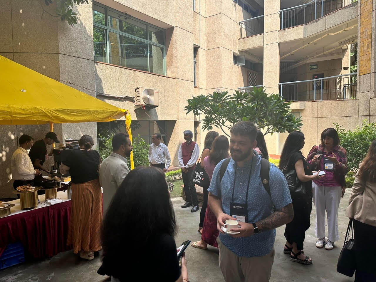 People chatting over coffee and tea.