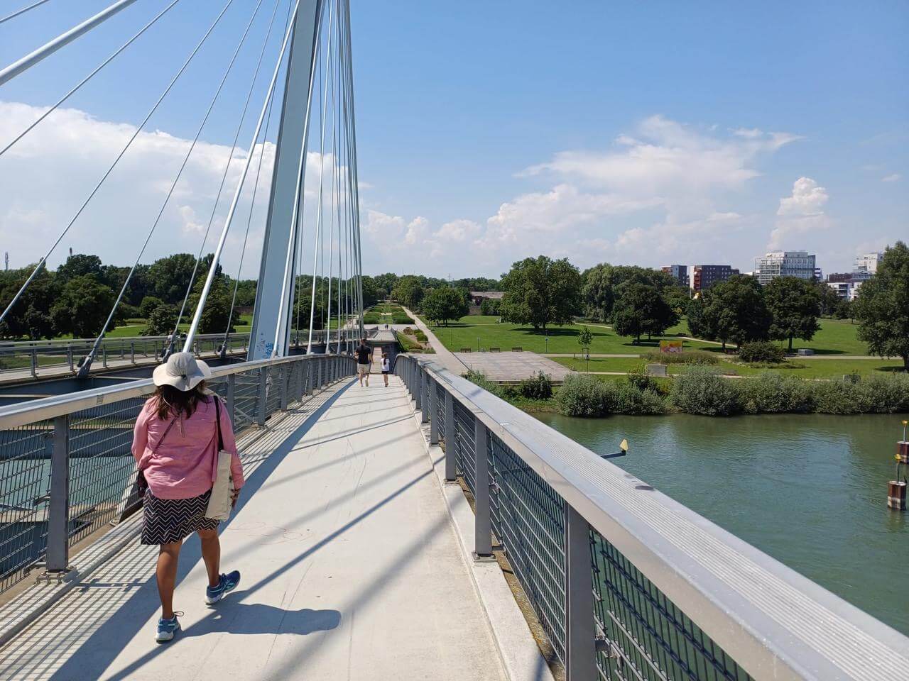 Woman walking on bridge