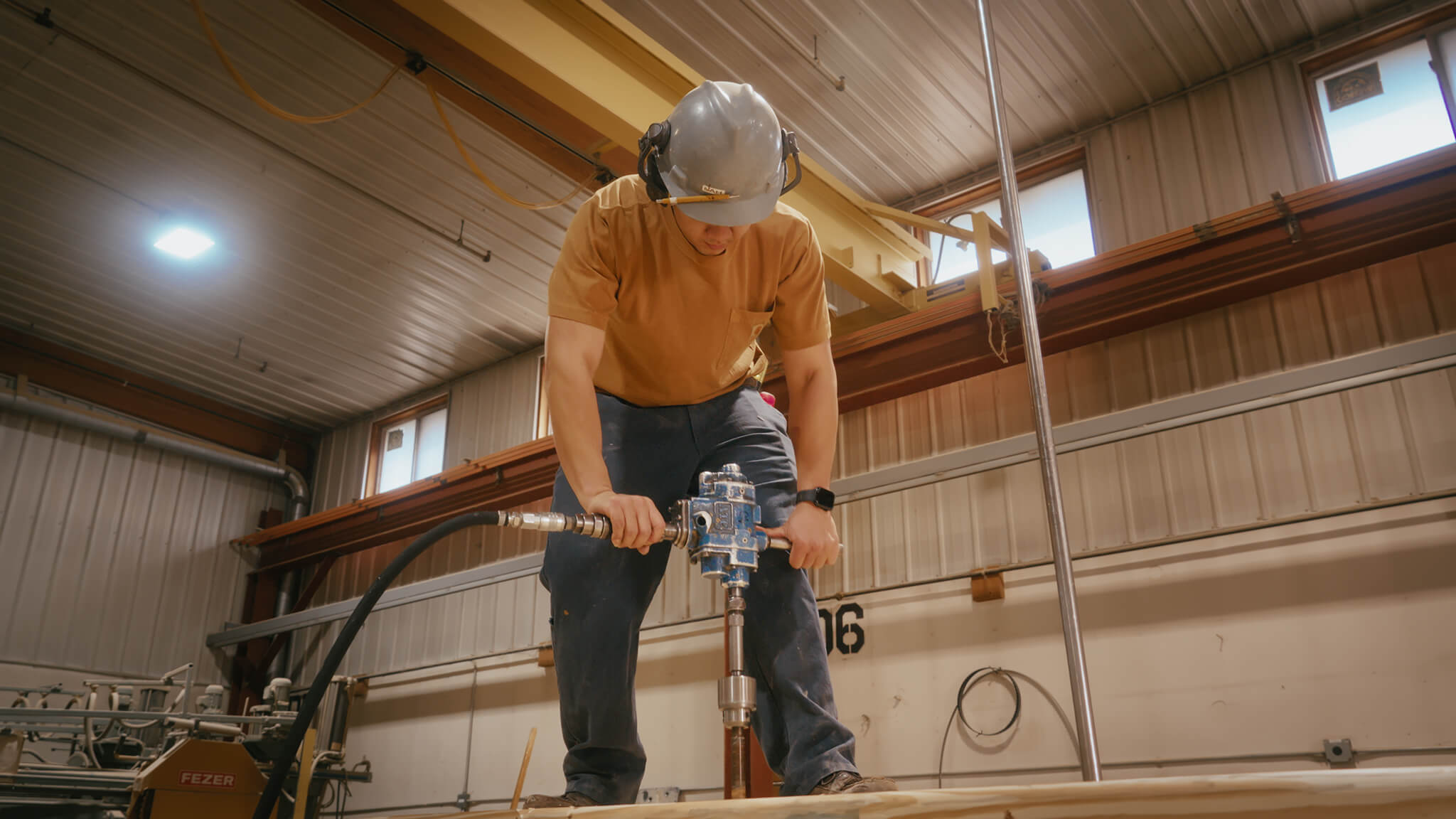 manufacturing-cohort still from Passion Pursuit video showing a man doing woodworking