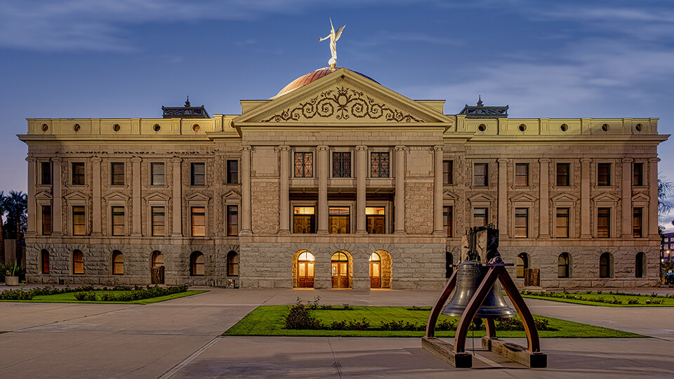 Arizona State Capitol with Liberty Bell at dusk
