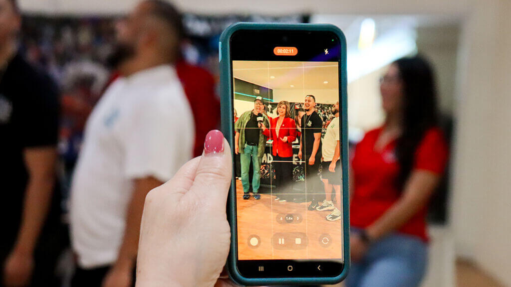 person taking photo of people at an event of the Greater Chamber of Harlingen