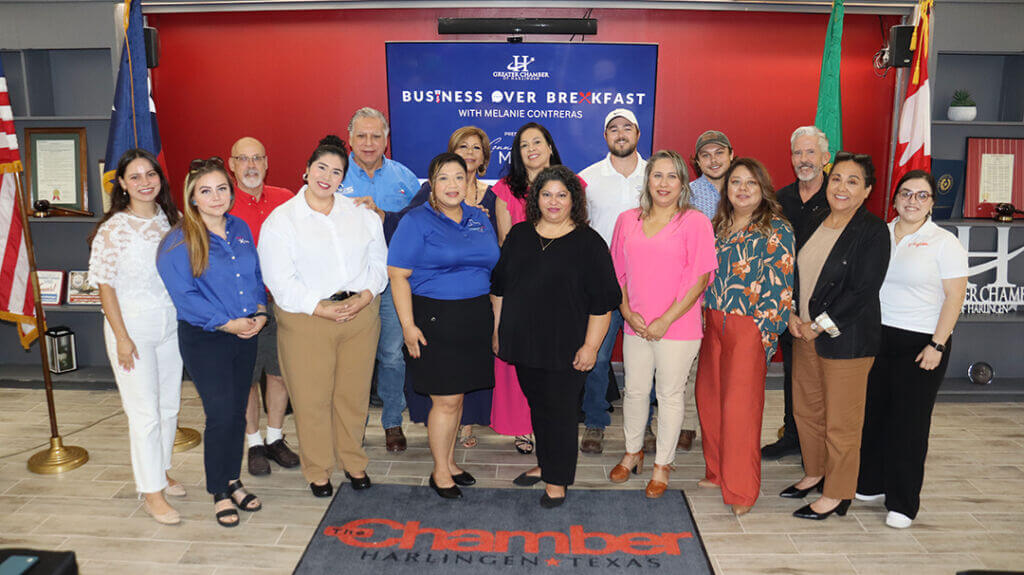 People attending Business over Breakfast event, networking and building connections that support local businesses in Harlingen.