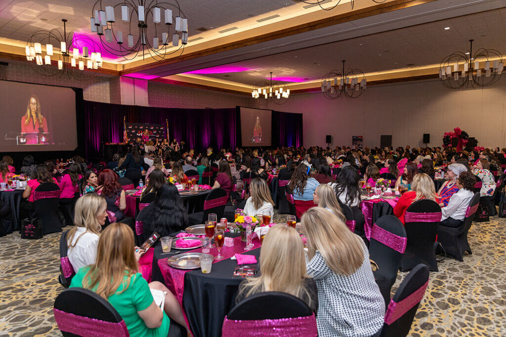 People attending an event of the Greater Chamber of Harlingen, highlighting economic growth in Harlingen Business District through local engagement.
