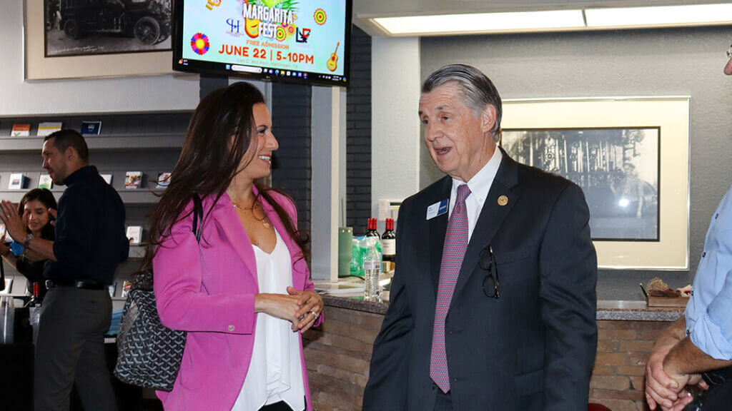 People at an event of the Greater Chamber of Harlingen, participating in the Harlingen TX business support network to strengthen local business ties.