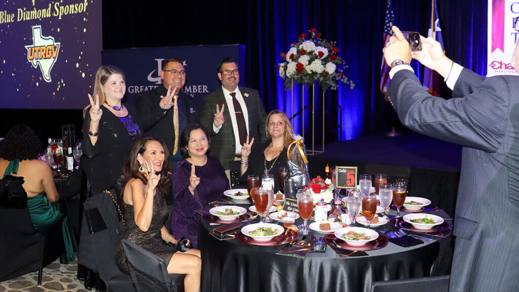 People attending a community event organized by the Greater Chamber of Harlingen, showing the purpose of the chamber of commerce in supporting local business engagement.